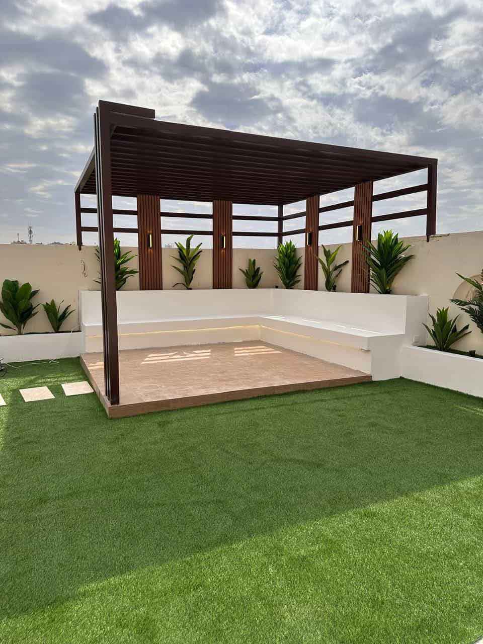 تنسيق حدائق أبوظبي ( مظلات خارجية )